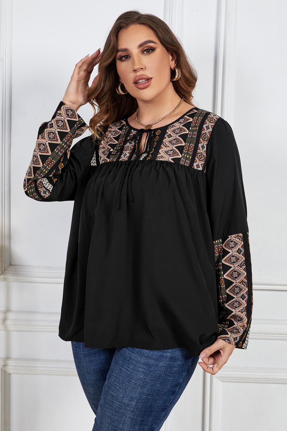 Melo Apparel Plus Size Printed Round Neck Tie Front Blouse